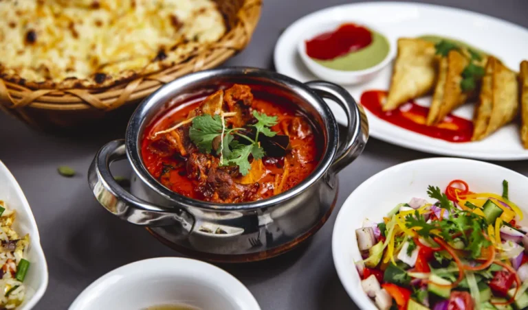 Indian vegetarian thali with dal, roti, rice, and sabzi