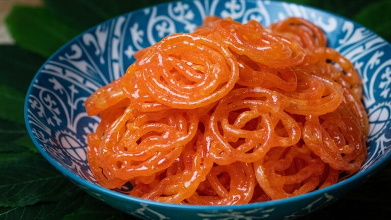Golden spiral Jalebi with glossy sugar coating