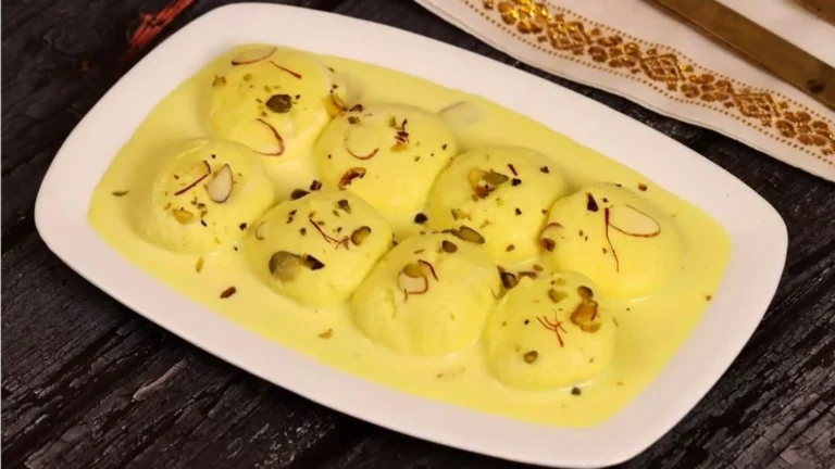 Authentic Rasmalai, a traditional Indian dessert served with saffron milk at an Indian restaurant in Vietnam.