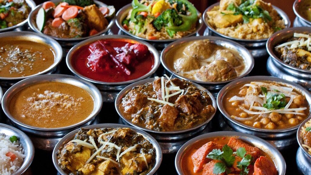 Indian vegetarian thali with dal, roti, rice, and sabzi
